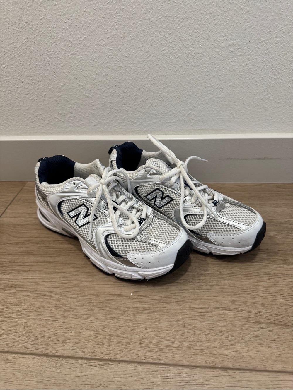 New Balance 530 White and Navy Athletic Sneakers